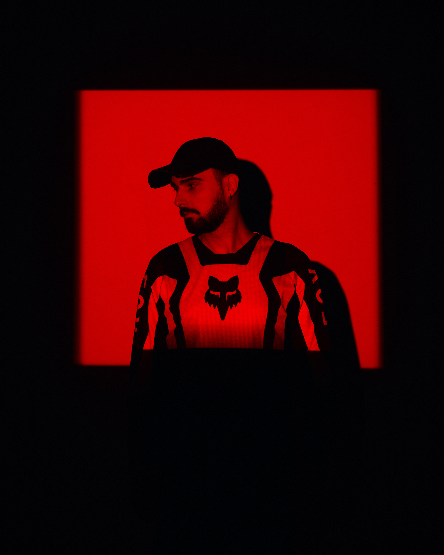 RH4DEZ silhouetted in a red frame
